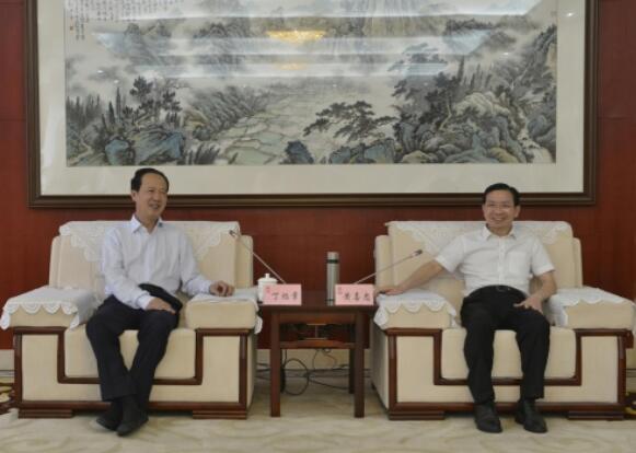 丁焰章拜會南昌市委副書記、市長黃喜忠